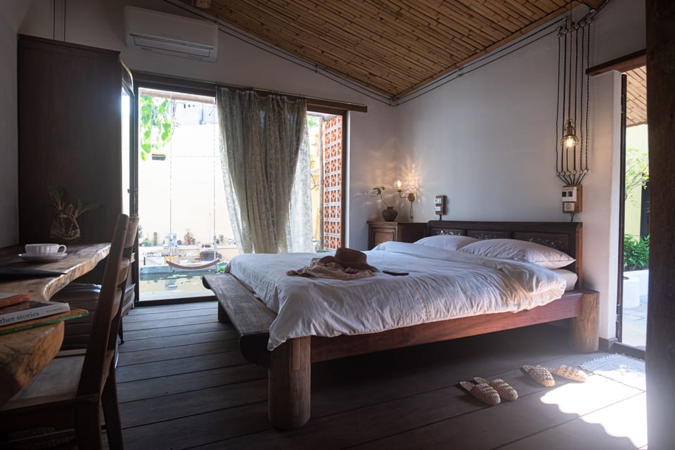 Deluxe Double Room | Minibar, desk, laptop workspace, blackout drapes