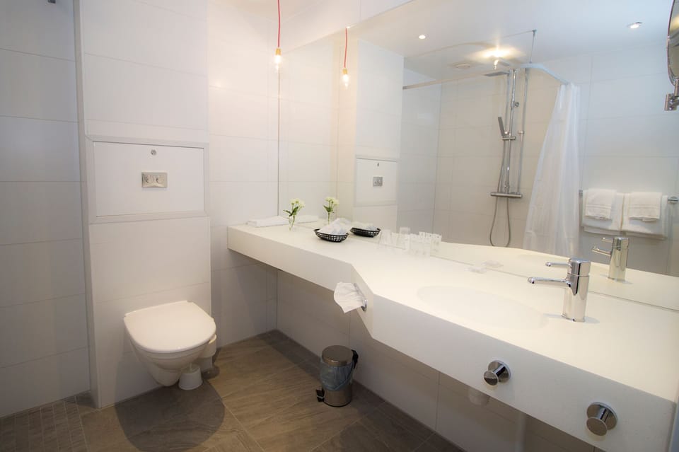 Comfort Family Room - Separate Building | Bathroom | Hair dryer, towels