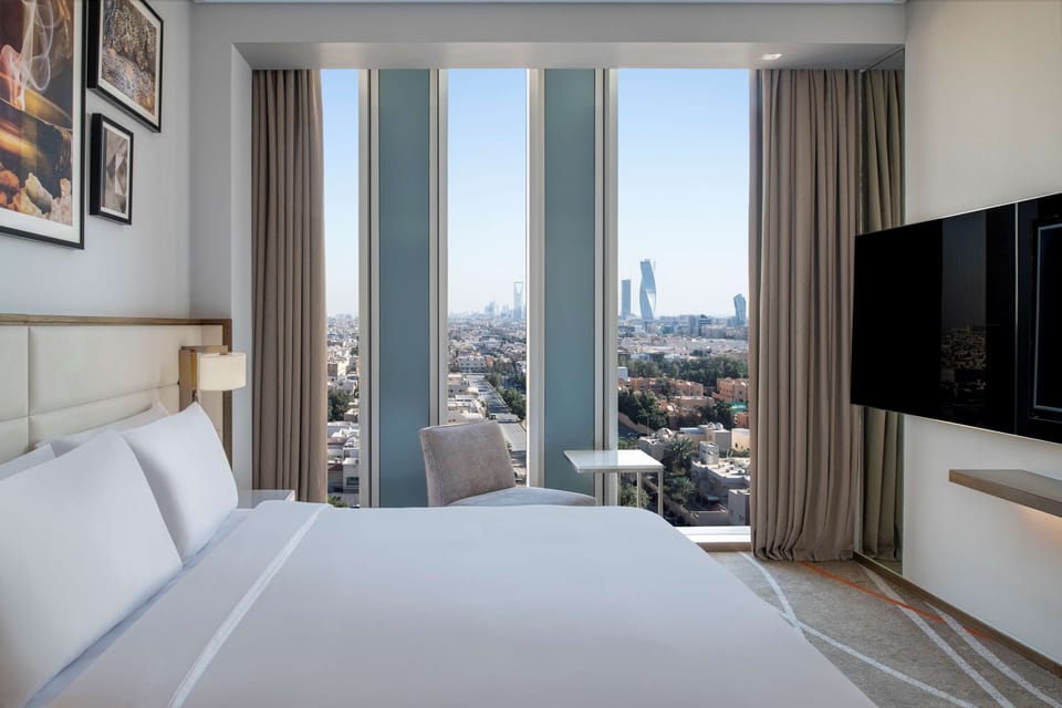 Premium bedding, memory foam beds, minibar, in-room safe