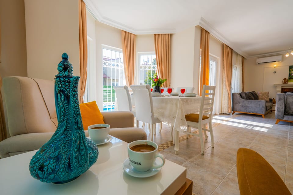 Deluxe Villa | Living room | LCD TV, fireplace