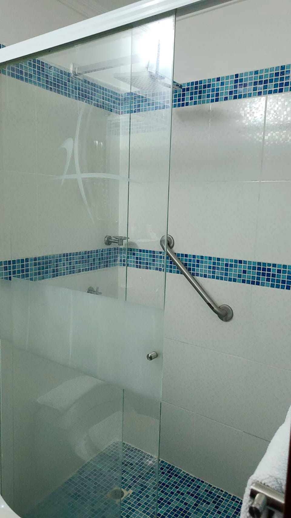 Rainfall showerhead, free toiletries, hair dryer, towels