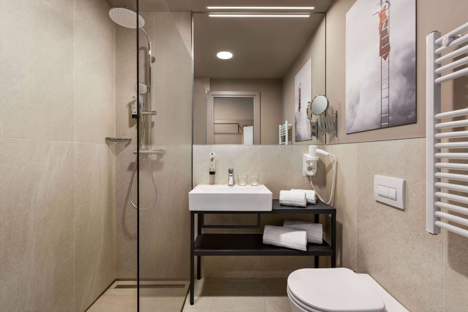 Shower, rainfall showerhead, eco-friendly toiletries, hair dryer