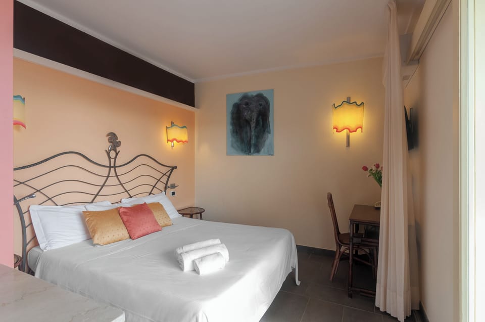 Standard Double or Twin Room | Minibar, in-room safe, desk, laptop workspace