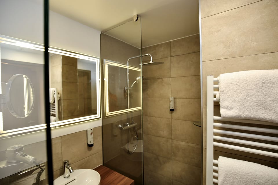 Shower, free toiletries, hair dryer, bathrobes