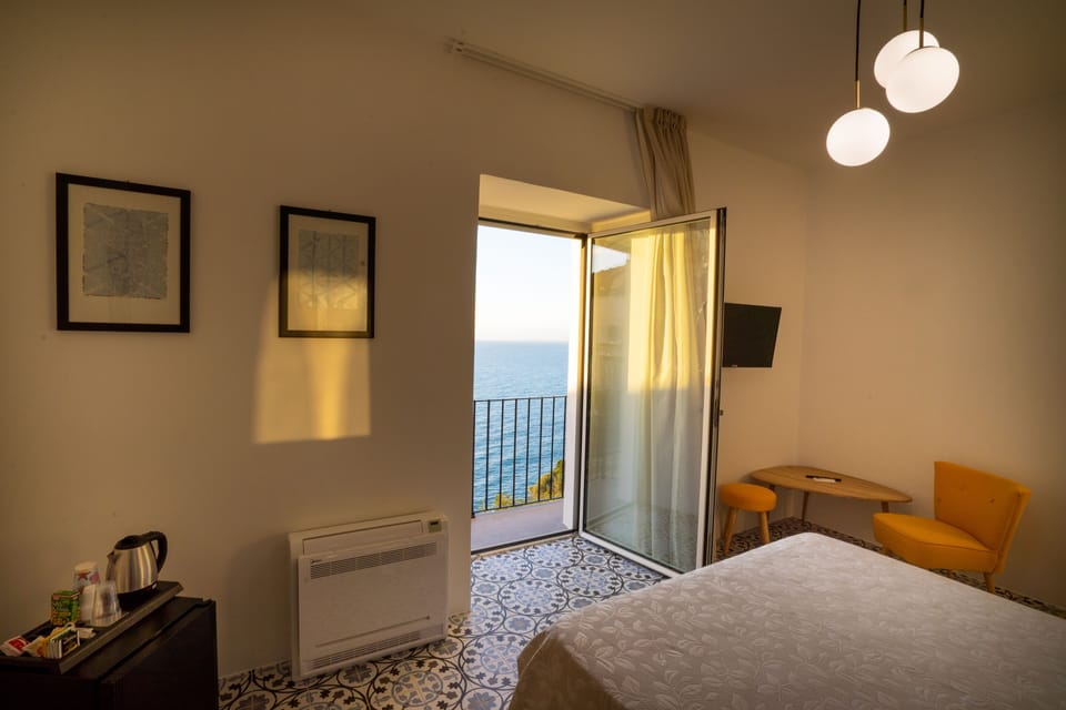 Superior Room, 1 Bedroom, Balcony, Sea View | Minibar, individually decorated, individually furnished, soundproofing