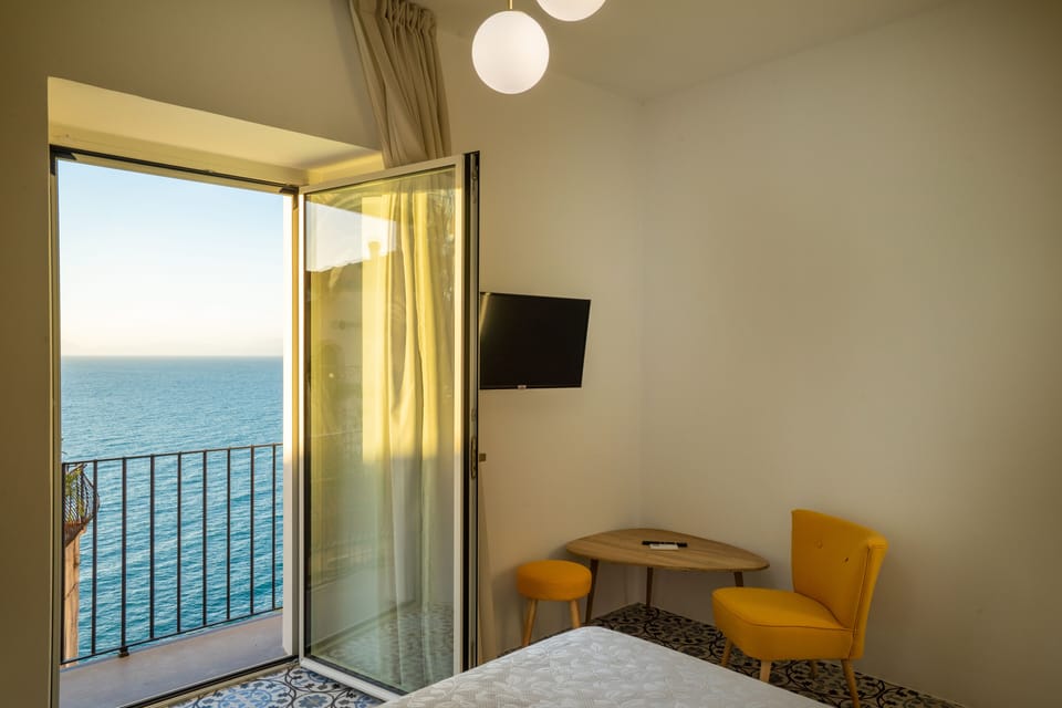 Superior Room, 1 Bedroom, Balcony, Sea View | Minibar, individually decorated, individually furnished, soundproofing