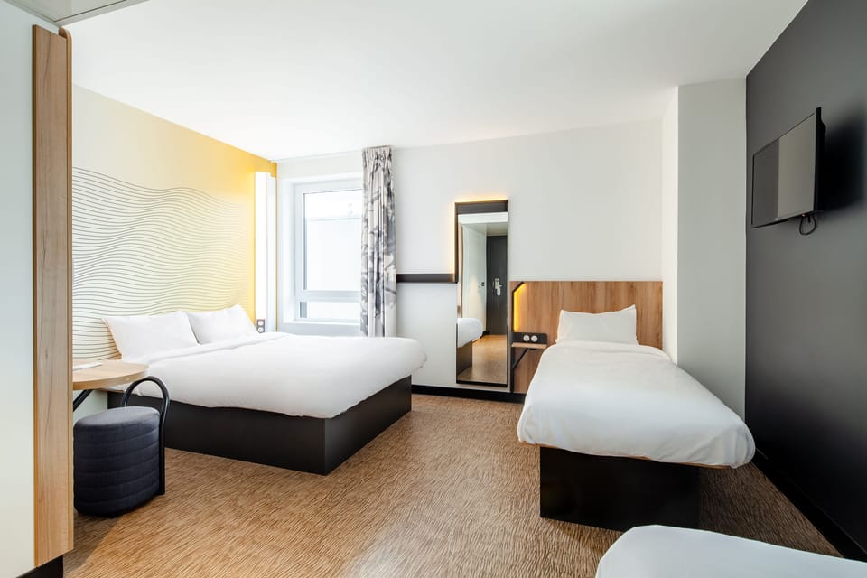 Quadruple Room | Premium bedding, desk, laptop workspace, blackout drapes