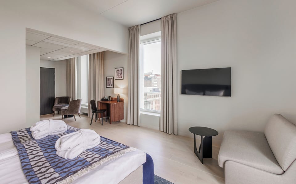 Deluxe Double Room | Desk, laptop workspace, blackout drapes, iron/ironing board