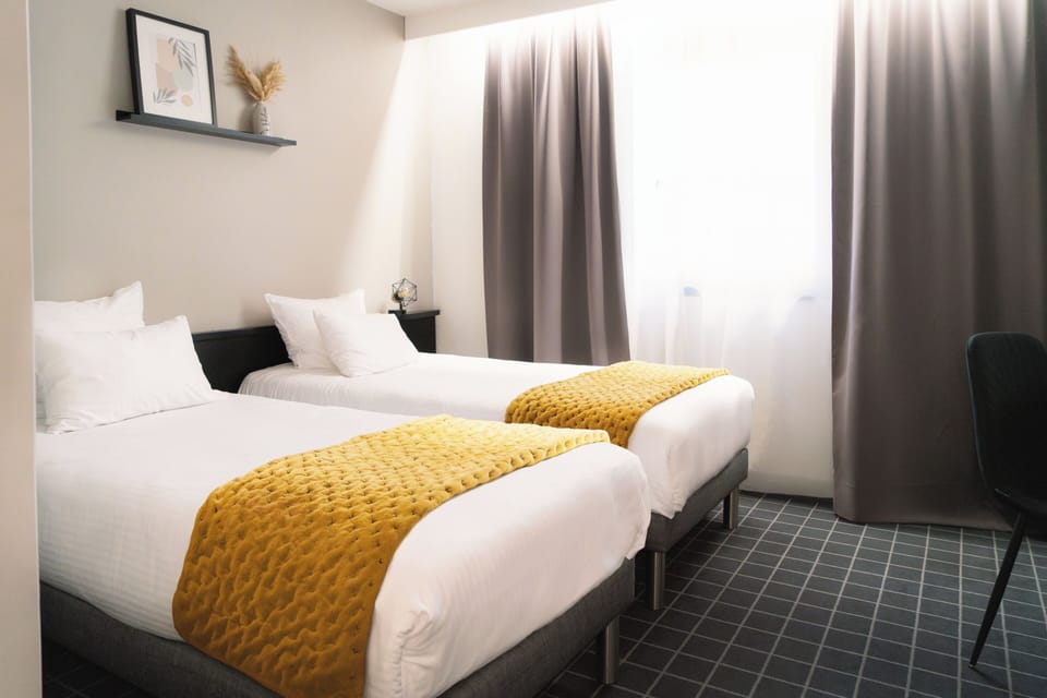 Standard Twin Room, Private Bathroom | Premium bedding, in-room safe, desk, blackout drapes