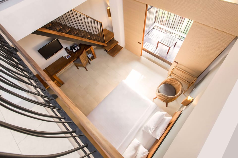 Duplex | In-room safe, desk, laptop workspace, blackout drapes