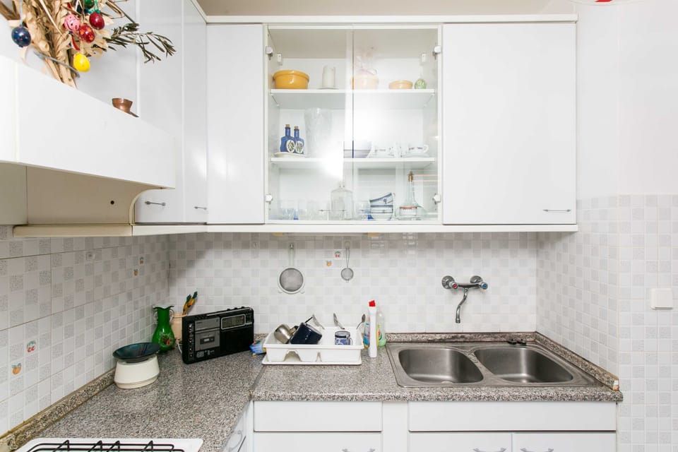Apartment (One Bedroom Apartment) | Private kitchen | Fridge, stovetop, electric kettle, cookware/dishes/utensils