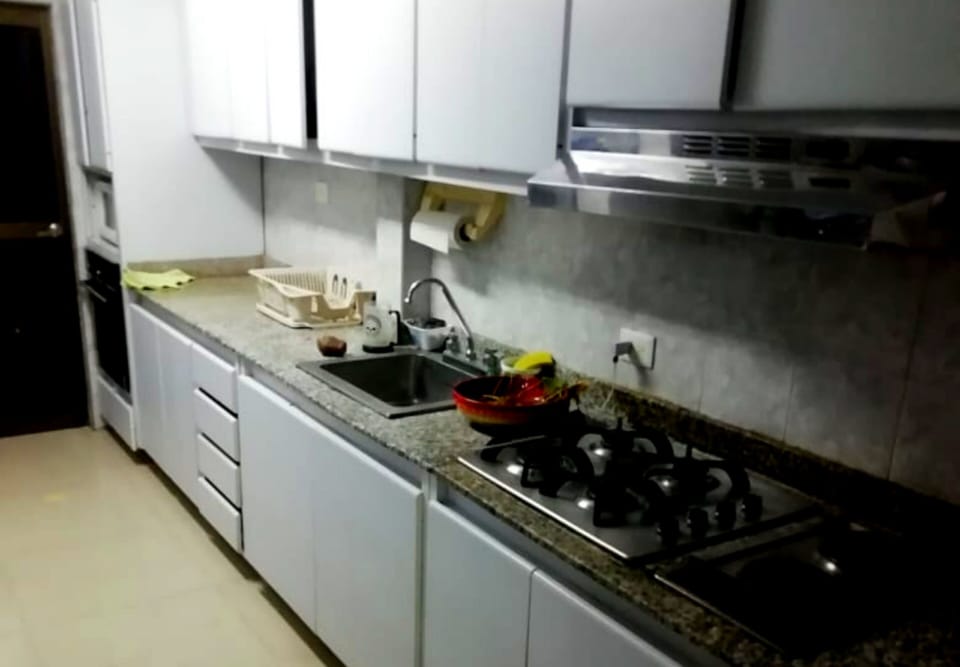 Full-size fridge, microwave, oven, cookware/dishes/utensils