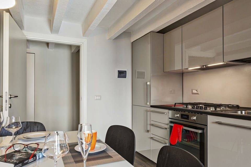 Apartment, 1 Bedroom, Balcony | Private kitchen | Full-size fridge, oven, stovetop, coffee/tea maker