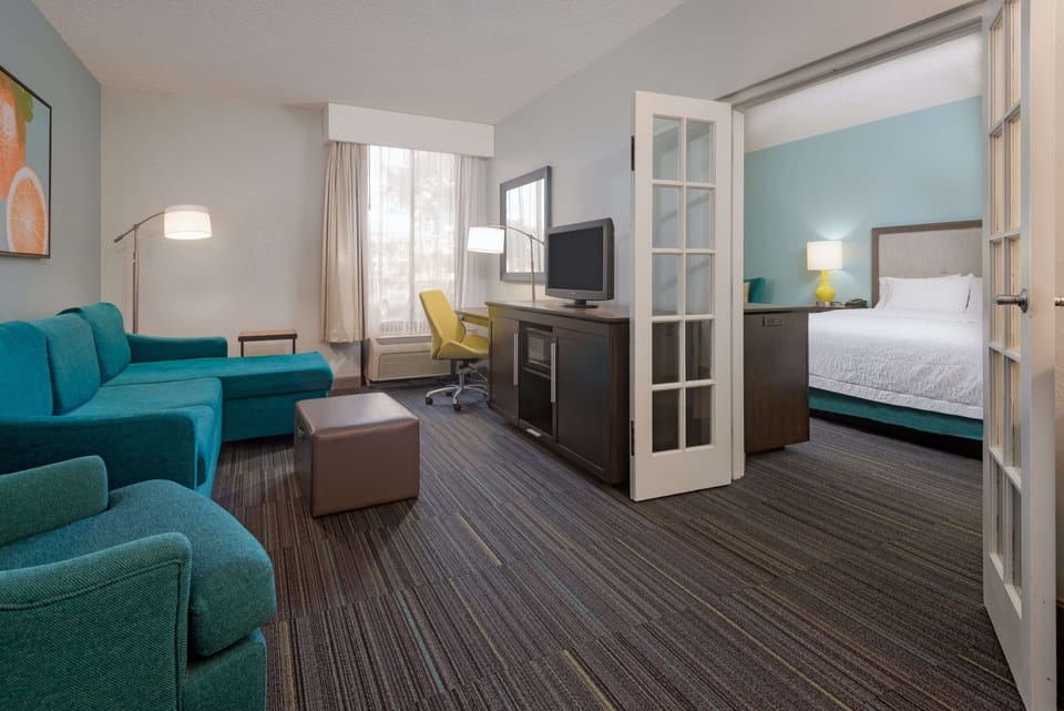 1 King 1Bdrm Suite w/ Sofabed, Non Smoking | In-room safe, desk, iron/ironing board, free WiFi
