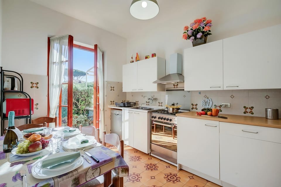 Family House, 3 Bedrooms, 2 Bathrooms, Sea Facing (Casa Maddalena al Mare 600m from sea) | Private kitchen | Dining table