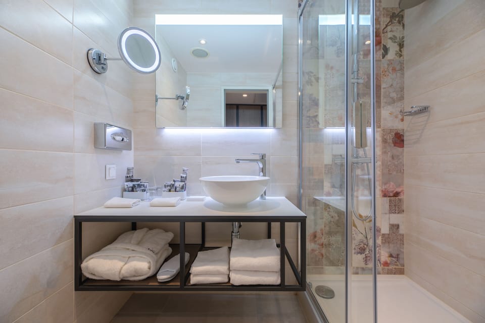 Eco-friendly toiletries, hair dryer, towels