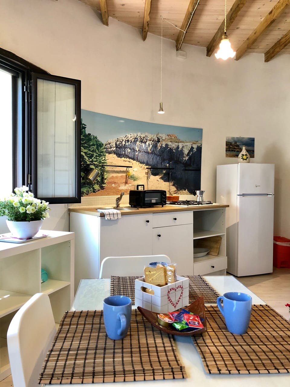 Apartment, 1 Bedroom, Garden View (Mirto) | Living area | Flat-screen TV, fireplace