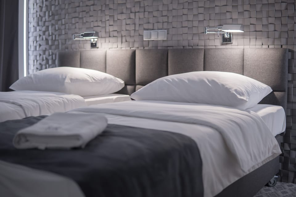 Executive Triple Room | Premium bedding, desk, laptop workspace, free WiFi
