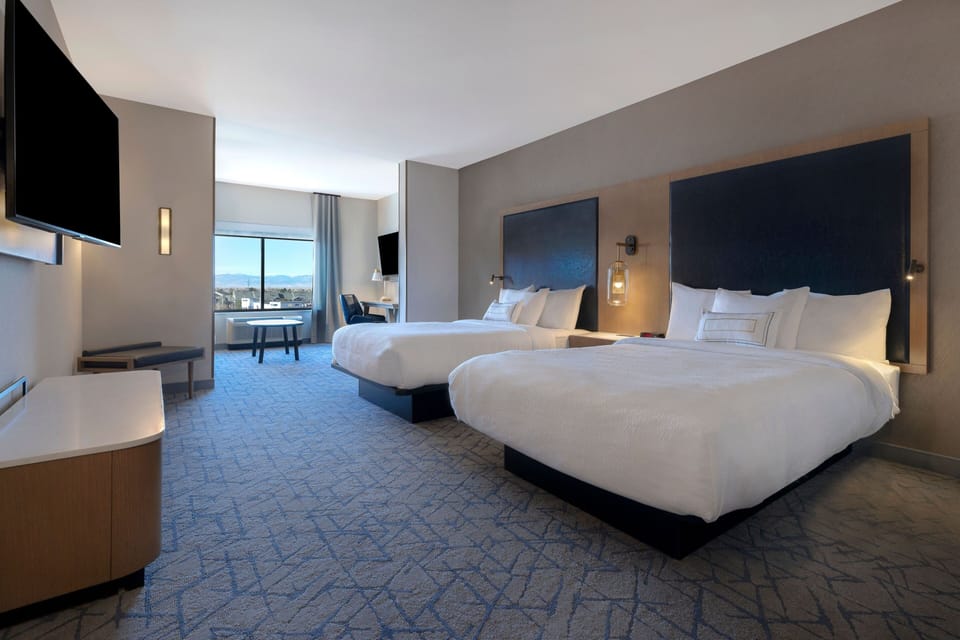 Premium bedding, down comforters, desk, laptop workspace