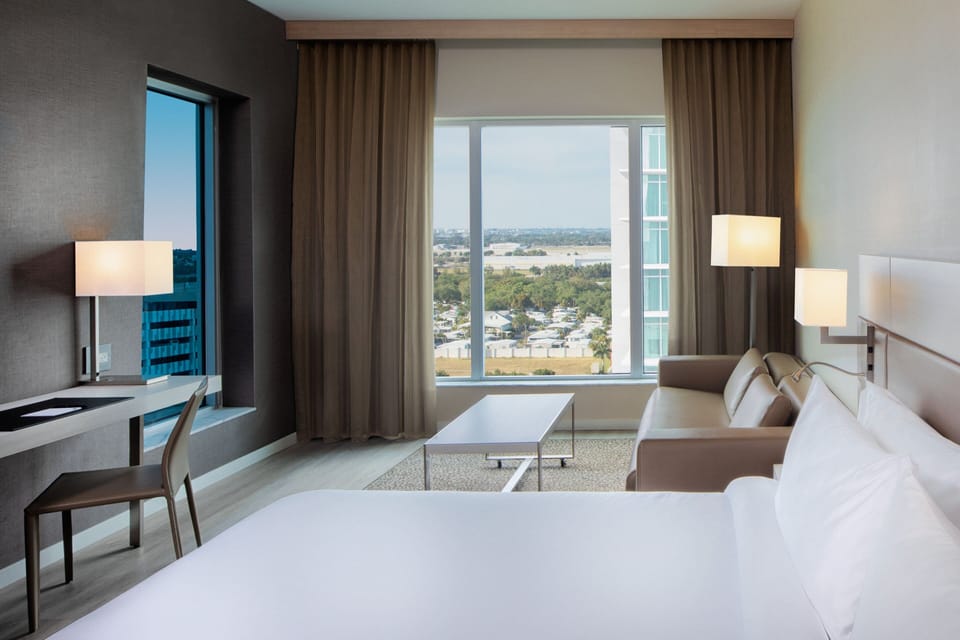 Premium Room, 1 King Bed with Sofa bed (View) | Premium bedding, in-room safe, desk, laptop workspace