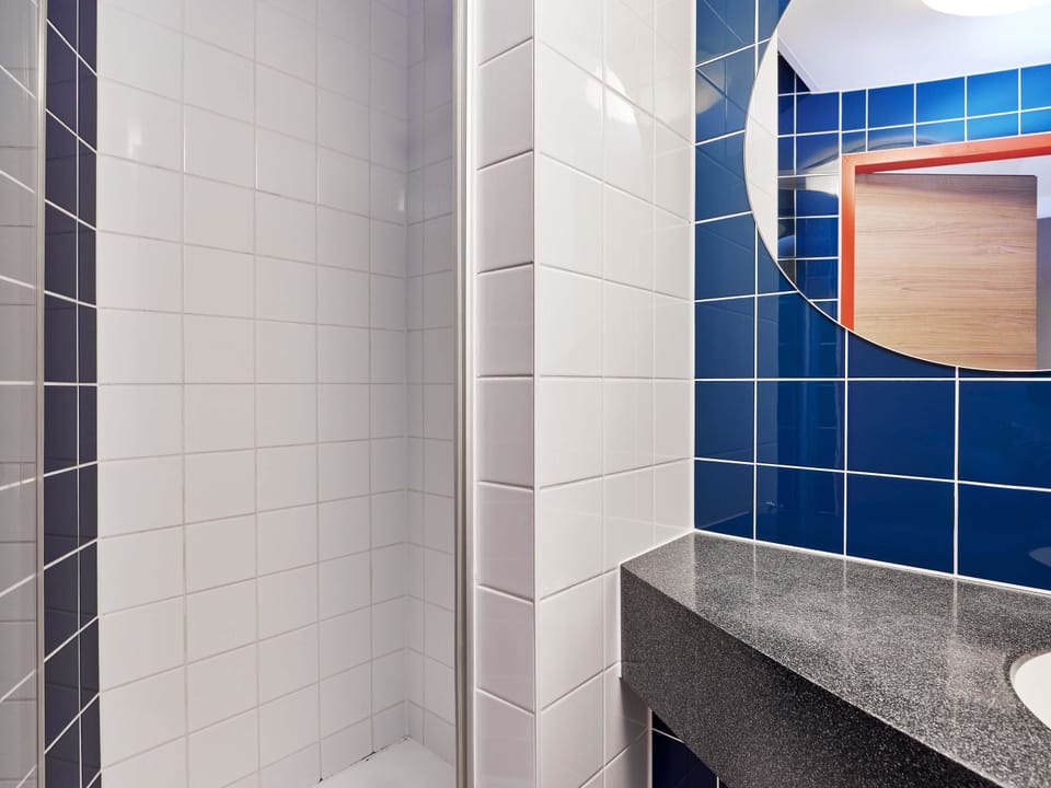 Shower, hair dryer, soap, shampoo