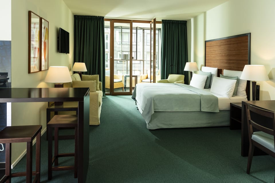 Premium bedding, down comforters, in-room safe, desk