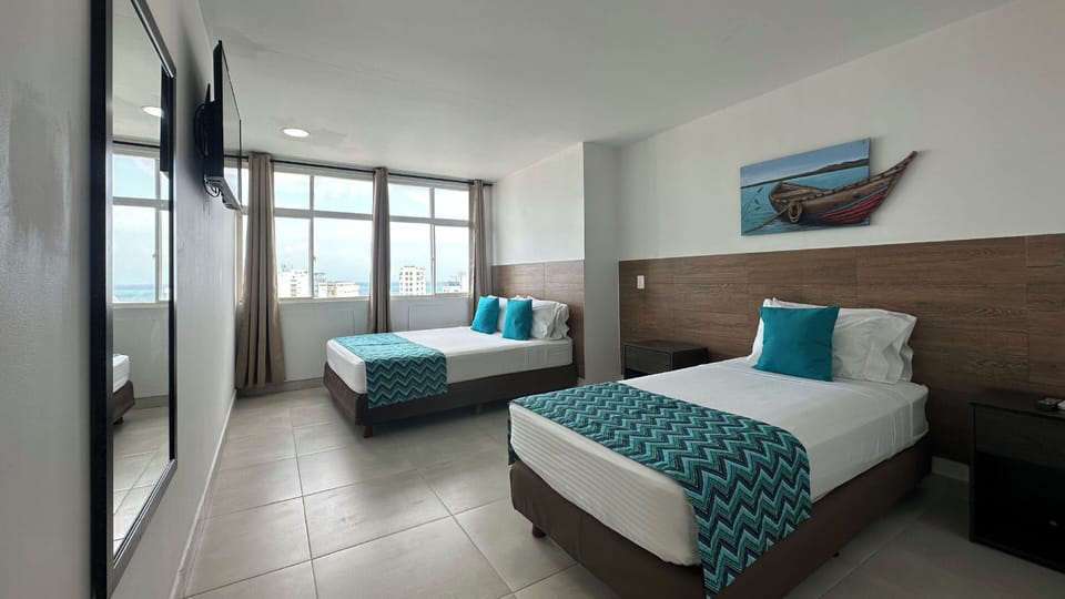 Family Triple Room | In-room safe, bed sheets