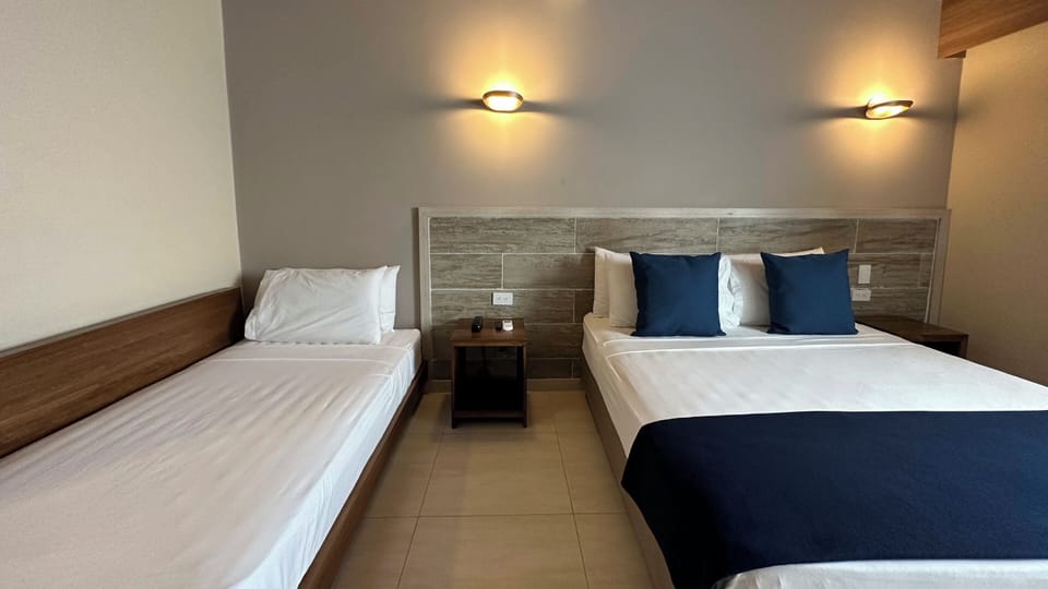 Triple Room | Bed sheets