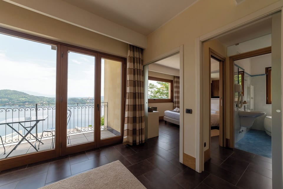 Luxury Suite, 1 Bedroom, Lake View | Living area | 50-inch LED TV with digital channels, Netflix, first-run movies