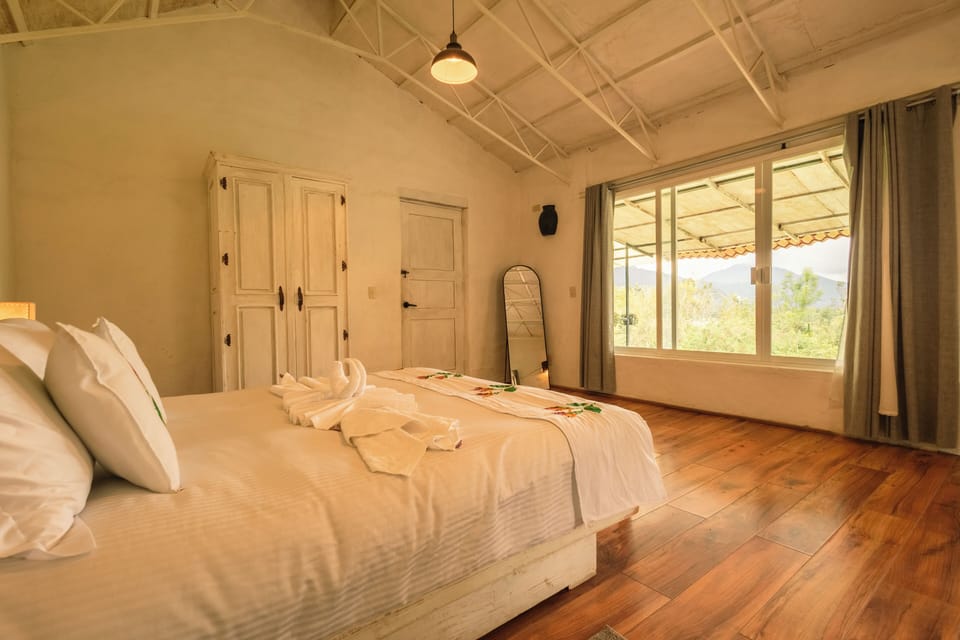 Deluxe Room, 1 King Bed, Ensuite, Valley View | Premium bedding, down comforters, individually decorated, rollaway beds