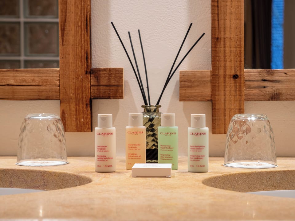 Hair dryer, bathrobes, slippers, towels