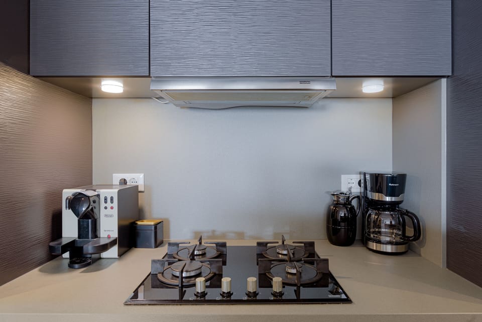 Luxury Villa, 4 Bedrooms, Sea View, Beachfront | Private kitchen | Full-size fridge, microwave, oven, stovetop