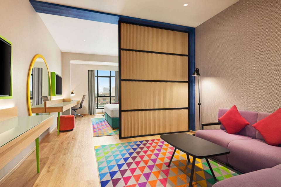 Junior Suite, 1 King Bed | Minibar, in-room safe, individually decorated, desk