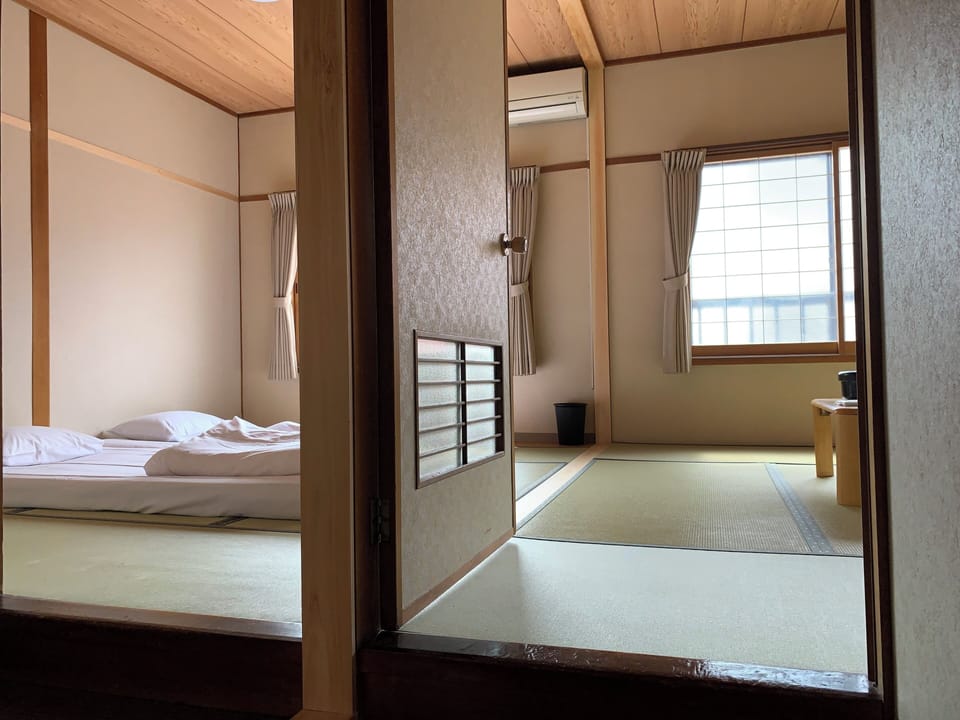 Basic Triple Room | Down comforters, in-room safe, individually decorated, desk