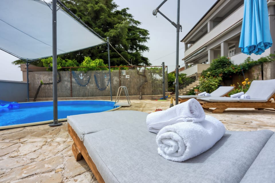 Family Apartment, Multiple Bedrooms, 2 Bathrooms (Pool Apartment Bakija) | Pool | Seasonal outdoor pool