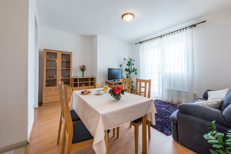 Apartment (Three-Bedroom Apartment with Balcony ) | Living room