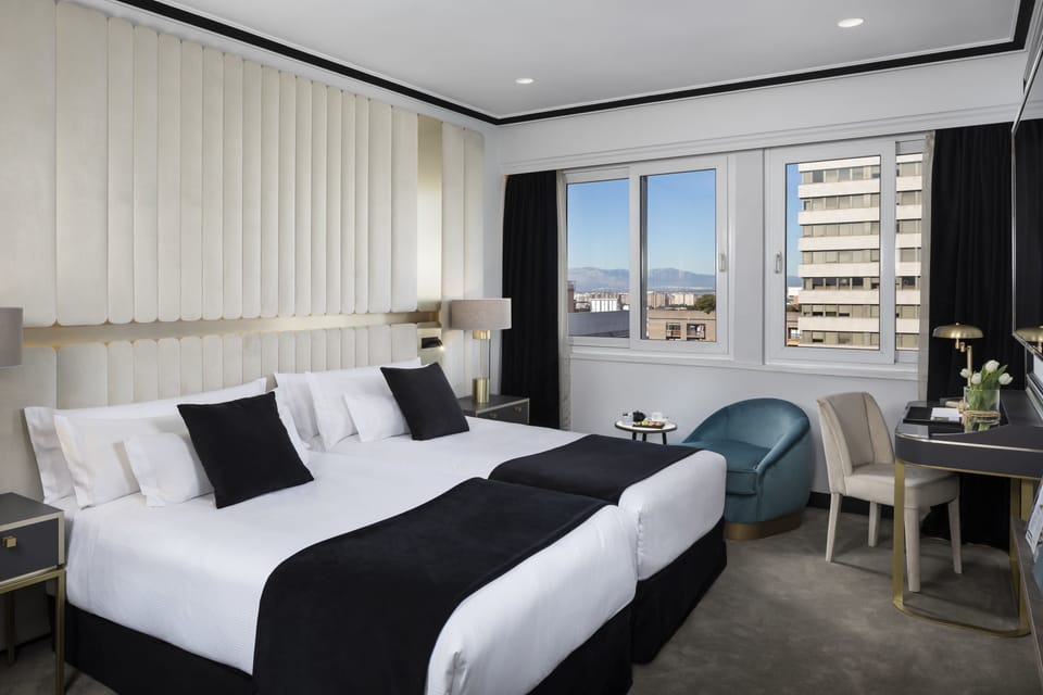 Down comforters, minibar, in-room safe, desk