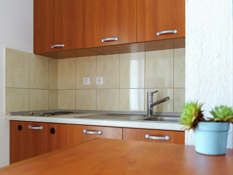 Studio, Balcony, City View | Private kitchen | Fridge, microwave, coffee/tea maker, electric kettle