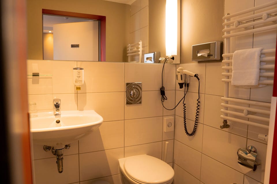 Shower, free toiletries, hair dryer, towels