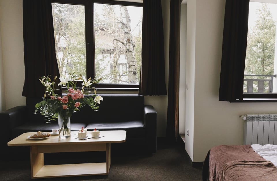 Royal Apartment | Living area | 29-inch LED TV with satellite channels, TV