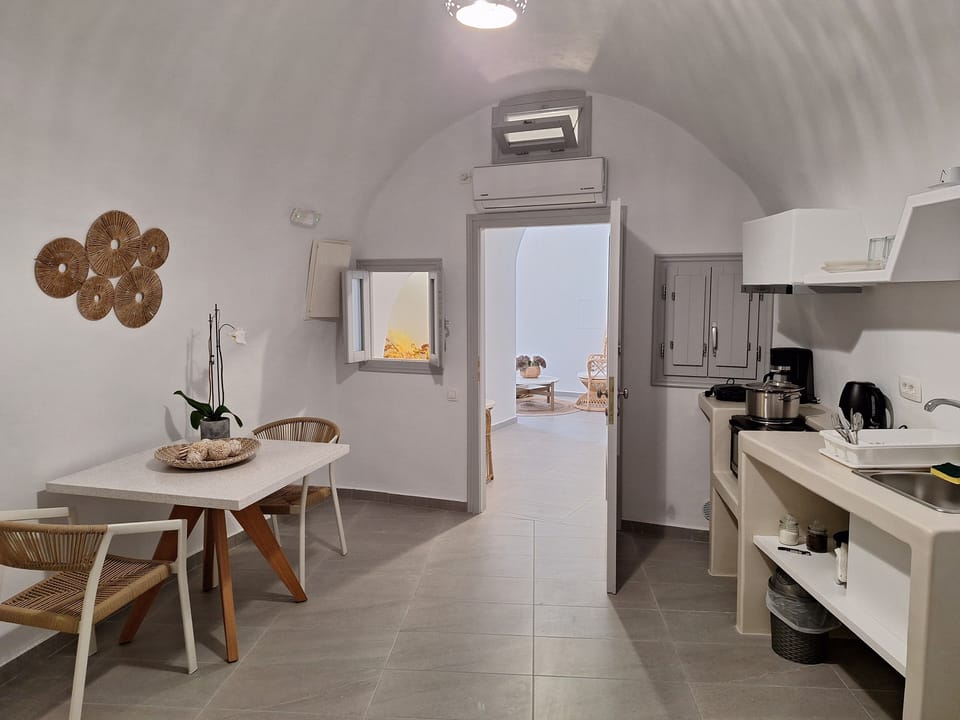 Two Bedroom Cave Villa | Living area | TV