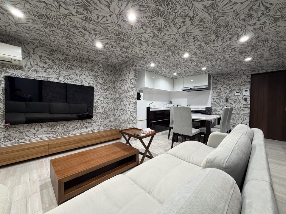 Super Suite, Non Smoking | Living area | Flat-screen TV, streaming services