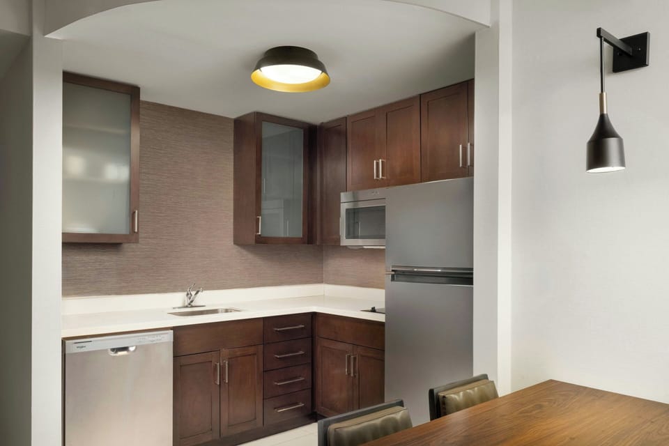 Suite, 1 Bedroom, City View | In-room safe, desk, iron/ironing board, free cribs/infant beds