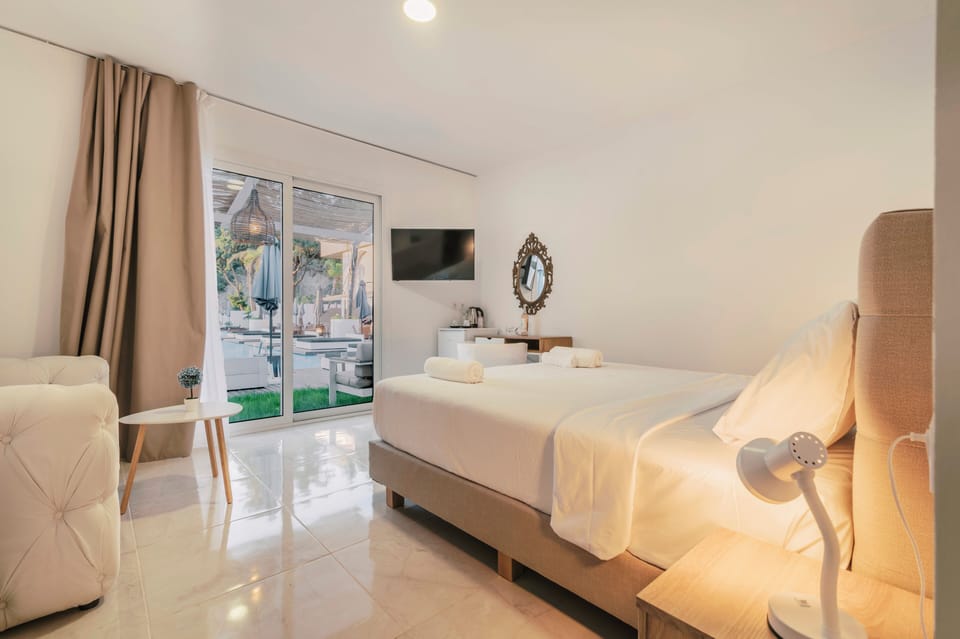 Junior Suite | Pool View | Individually decorated, individually furnished, desk, blackout drapes