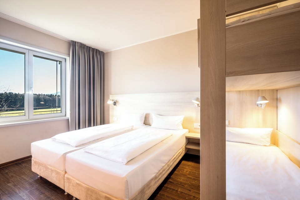 Family Room | Pillowtop beds, desk, free WiFi, bed sheets