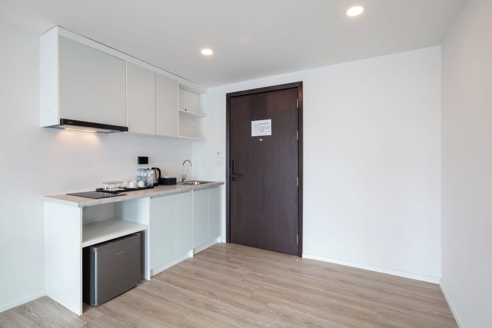 Luxury One Bed Room Suite | Living area | 32-inch LED TV with digital channels, TV