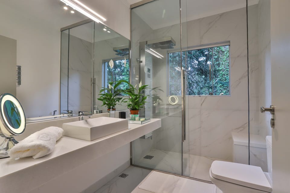 Suite (Specialle) | Bathroom | Designer toiletries, hair dryer, bathrobes, slippers