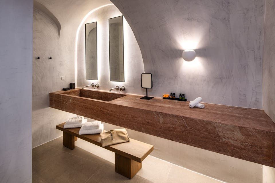 Superior Cave Double Courtyard View | Bathroom | Shower, hair dryer, slippers, towels
