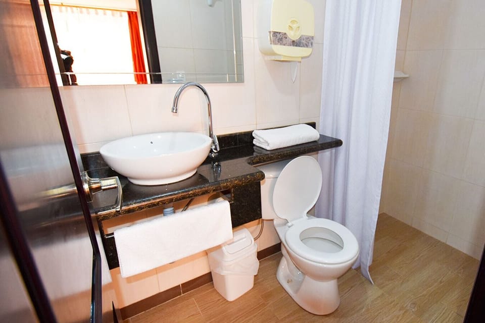 Superior Single Room, 1 Bedroom | Bathroom | Shower, rainfall showerhead, free toiletries, hair dryer (on request)