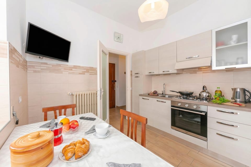 Family Apartment, Multiple Bedrooms (Residenza La terrazza di Dante) | Private kitchen | Fridge, oven, stovetop, coffee/tea maker